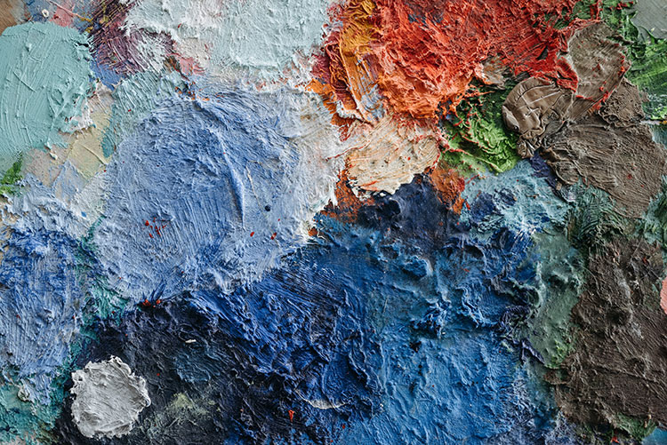 Multi-colored, heavily-textured abstract oil painting, primarily in blues with red accents